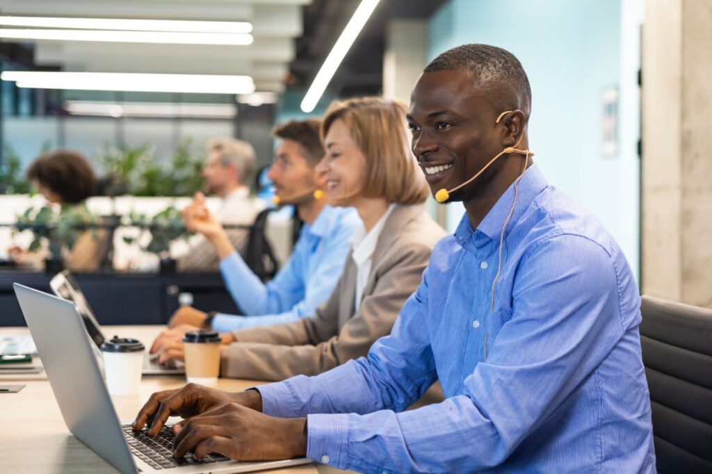 Contact center quality assurance team managing agent performance monitoring during rapid growth