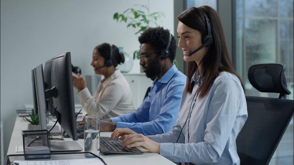 QA manager and supervisor reviewing AI call scoring outputs and calibration alignment session results during ChorusCX automated quality assurance platform rollout