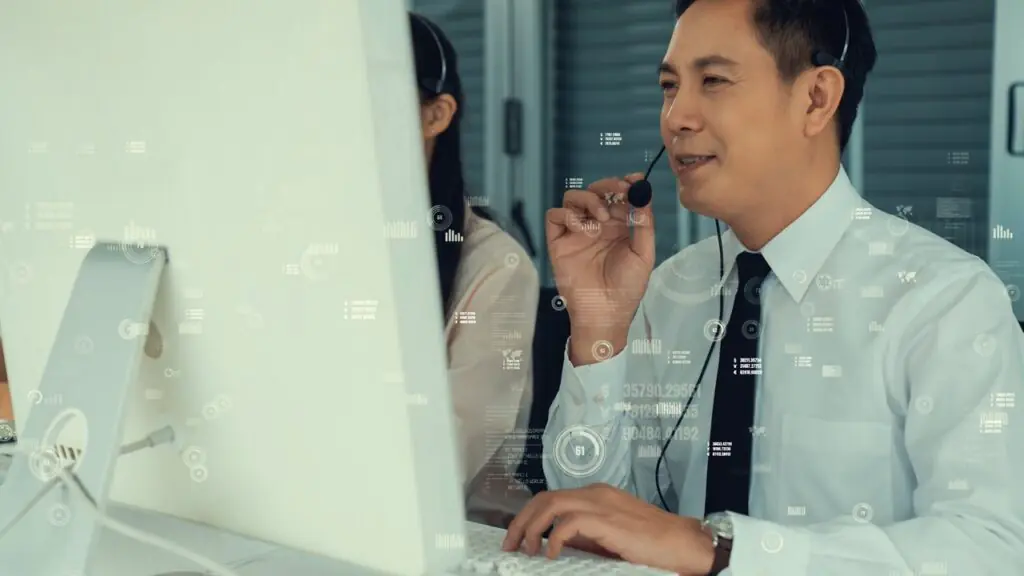 Contact center supervisor reviewing agent guidance measurement data on a performance dashboard