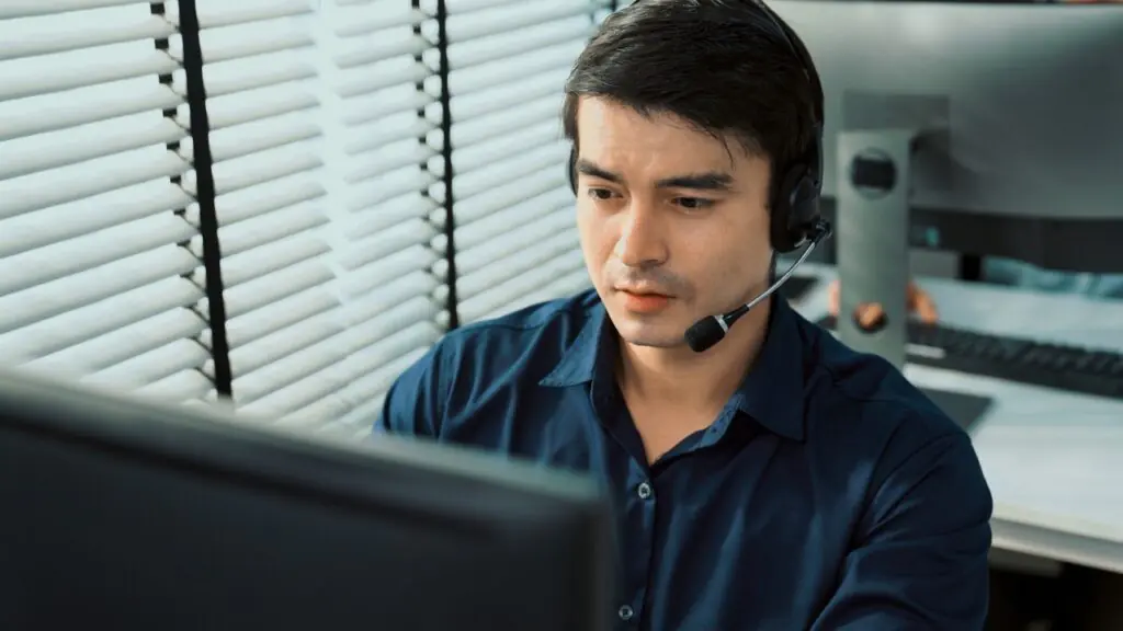 supervisor comparing QA scorecards across multiple contact center campaigns