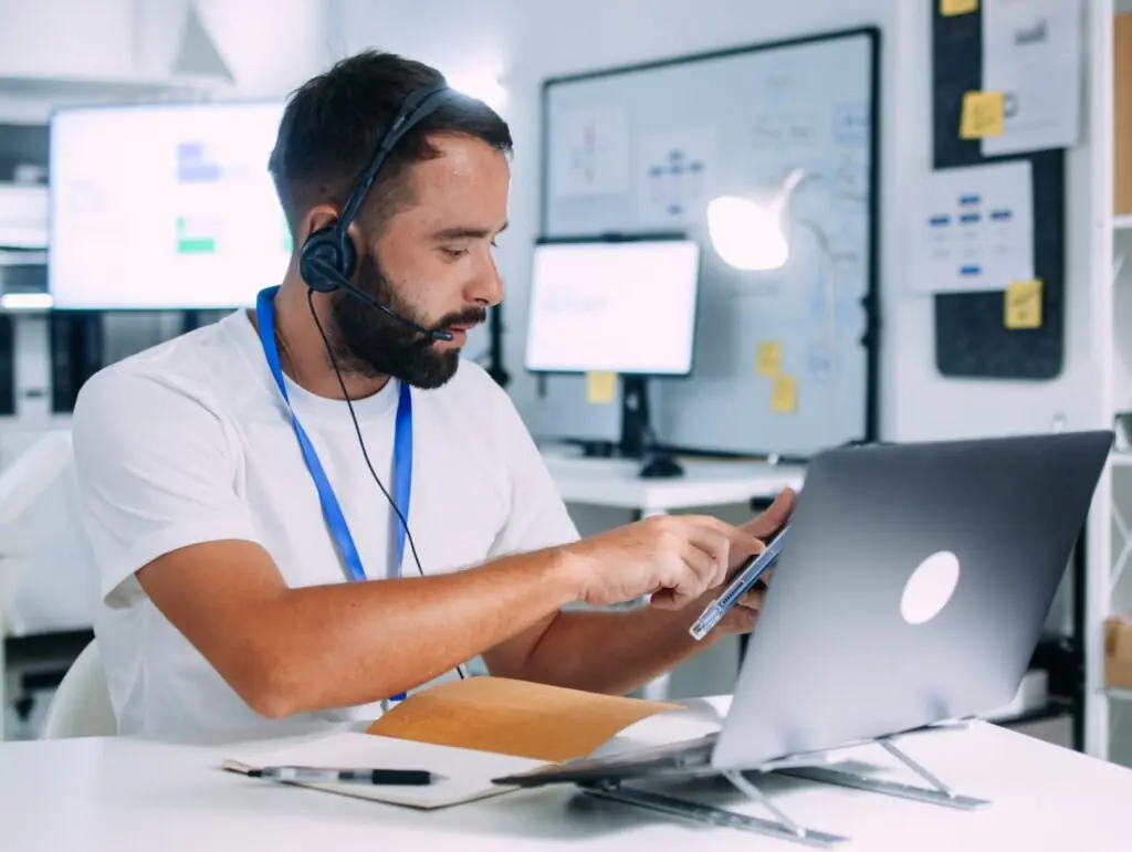 Contact center leader meeting with a managed support partner team to evaluate services beyond the SLA