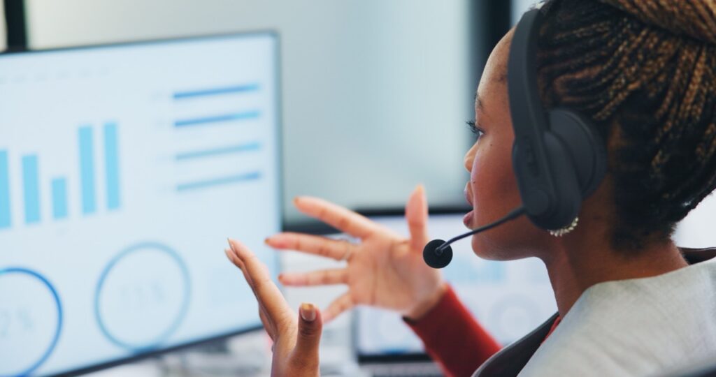 contact center supervisor reviewing a QA scorecard flagged for scorer variance and sampling bias