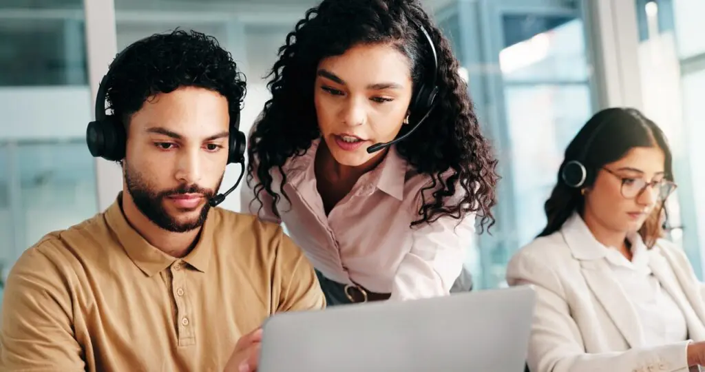 Mid-market contact center operations team working alongside a managed support engineer to optimize platform performance