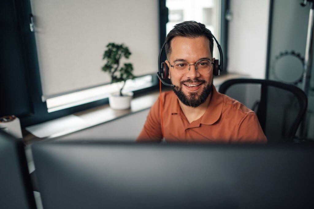 IT operations team monitoring contact center platform alerts on a dashboard