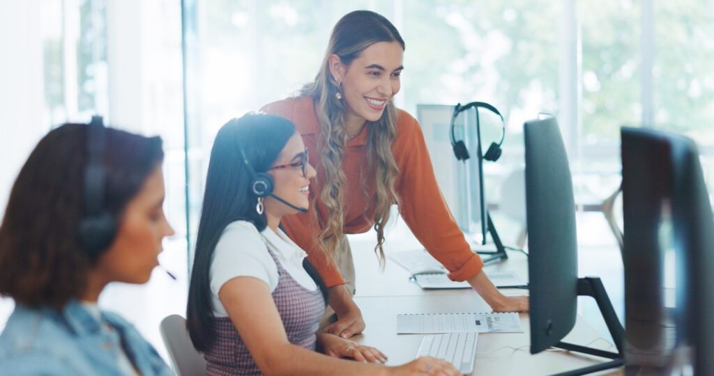 Contact center supervisor reviewing interaction recording data across QA and compliance dashboards