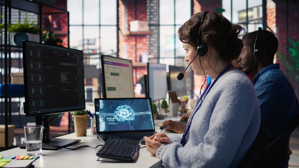 Contact center agents with headsets working across a multi-site contact center operation